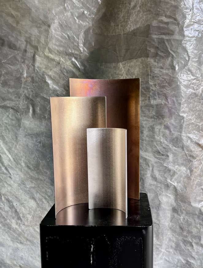 Nuances sculpture, three steel finishes
